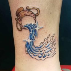 Vattumannen (stjärntecken) tatuering: Betydelse, design, historia och foton